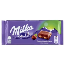 MILKA EGÉSZMOGYORÓS ALPESI TEJCSOKOLÁDÉ EGÉSZ MOGYORÓVAL 100 G